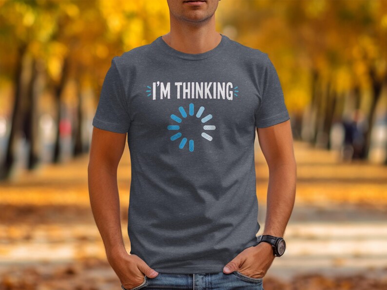 Grey t-shirt with "I'M THINKING" and a blue loading circle graphic.