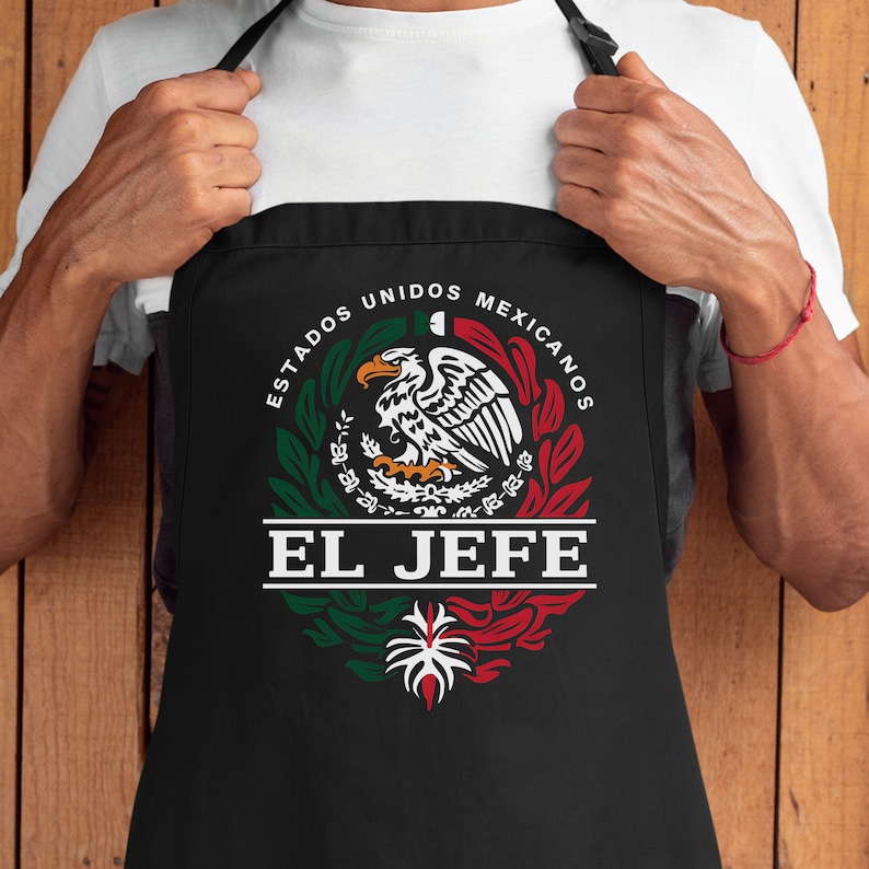 May include: Black apron with a white design featuring the Mexican coat of arms with the text "Estados Unidos Mexicanos" and "El Jefe" below.