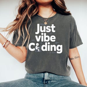 May include: A set of three ceramic mugs with a speckled, matte finish. The mugs are in shades of cream, light gray, and dark gray. Each mug has a simple, minimalist design, perfect for coffee or tea.