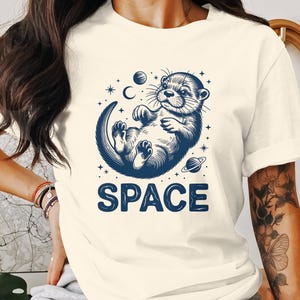 Cute Otter Space Graphic T-Shirt, Outer Space Animal Lover Hoodie, Adorable Cartoon Sweatshirt for Kids and Adults