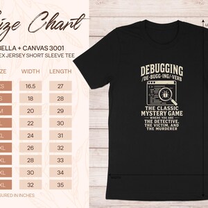 Black t-shirt with "Debugging: The Classic Mystery Game" graphic and a size chart.