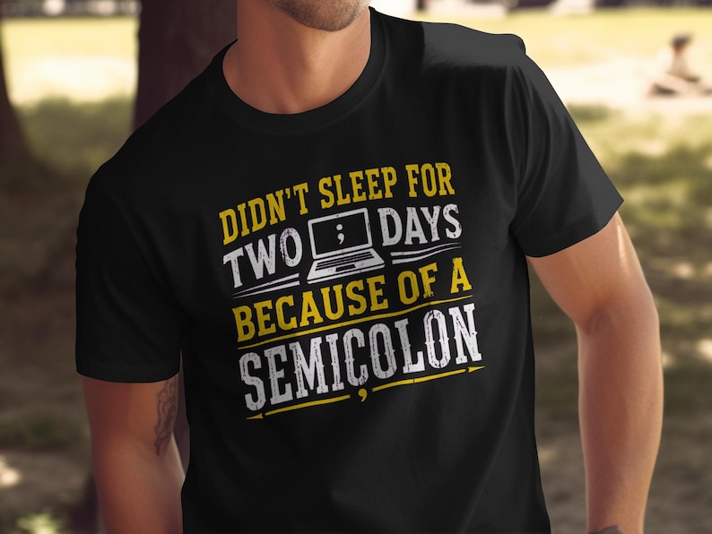 Black t-shirt with text: Didn't sleep for two days because of a semicolon.