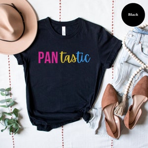 May include: Black t-shirt with the text "PANtastic" in pink, yellow, and blue lettering.