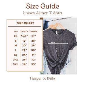 May include: Size chart for a unisex jersey t-shirt. The chart shows the width and length measurements in inches for sizes XS to 3XL. A gray t-shirt is shown on a hanger with the width and length measurements marked.
