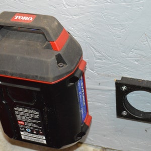 Suporte de armazenamento de bateria Toro 60v