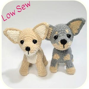 May include: Two crocheted Chihuahua dog figurines. One is tan, the other is gray with tan accents. Both have large ears, black eyes, and black noses. The text "Low Sew" is in pink in the upper left corner.