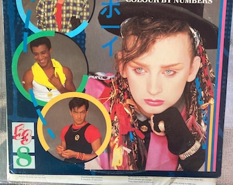Culture Club- Colour By Numbers. Original vinyl record in VG+ condition. Very clean copy with no scratches or marks. Includes inner
