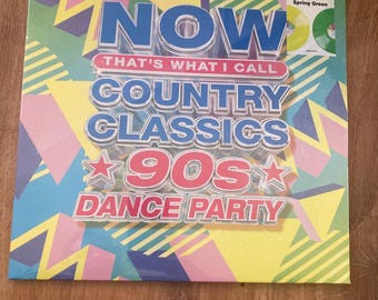 Now That’s What I call Country classics 90’s Dance Party. Sealed 2LP on lemon yellow and spring green vinyl. :)