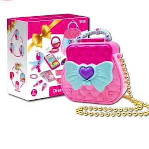 May include: A pink plastic toy purse with a blue bow and a gold chain. The purse has a heart-shaped charm and a zipper closure. The purse is labeled "Dress Up" and is for ages 3 and up.