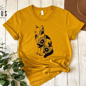 Cat silhouette filled with yellow sunflowers