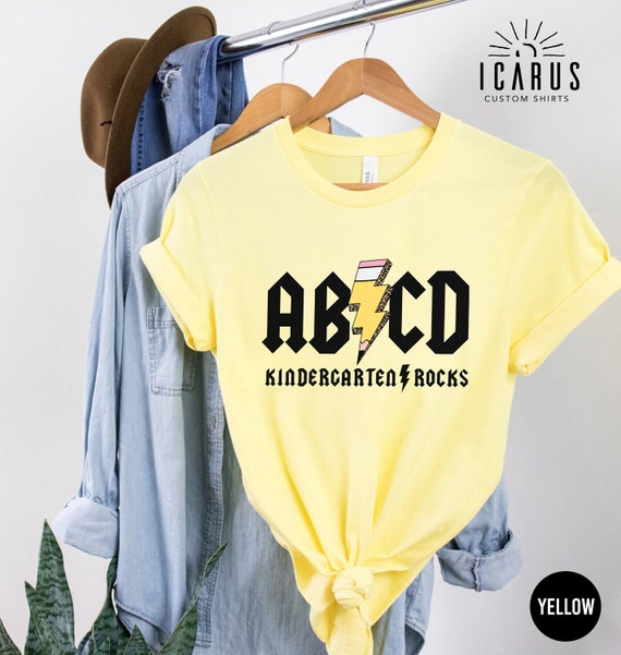 ABCD Kinder Rocks T-Shirt Funny Teacher Gift Tee Shirt ABCD Kinder Rocks T-Shirt Funny Teacher Gift Tee Shirt