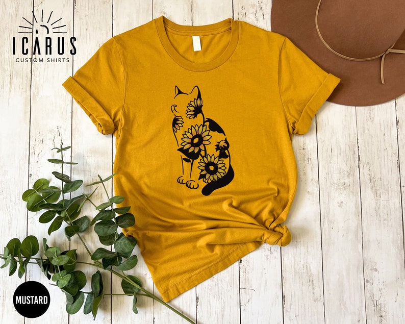 Cat silhouette filled with yellow sunflowers