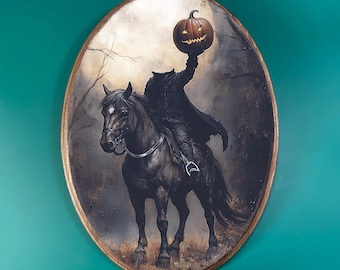 May include: Oval artwork showing the Headless Horseman on a black horse, holding a carved pumpkin. The artwork has a gold border and is set against a teal background. The style is reminiscent of a classic painting, with a dark, atmospheric feel.
