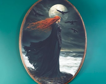 May include: Oval artwork depicting a woman with flowing red hair and a long black cloak standing on a rocky shore. A full moon and several crows are in the stormy sky. The artwork is framed with a gold-colored border.