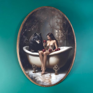 May include: Oval-shaped artwork featuring a woman in a bathtub with a wolf. She holds red apples. The tub has ornate gold feet. The artwork has a gold frame and is set against a teal background.