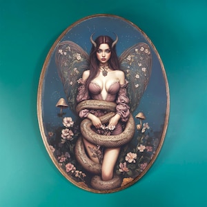 May include: A painting of a woman with butterfly wings and horns, wrapped in a snake, surrounded by flowers and mushrooms. The woman is wearing a pink dress and has long dark hair.