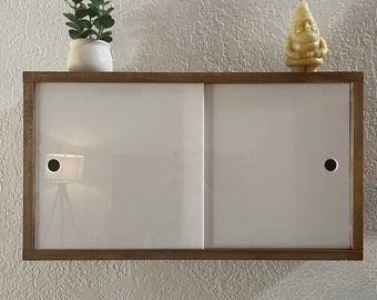 Minimalistic Floating Shelf with Acrylic Sliding Doors