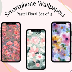 May include: Three smartphones displaying pastel floral wallpapers. The wallpapers feature watercolor designs of pink, white, yellow, and blue flowers. The text at the top reads "Smartphone Wallpapers Pastel Floral Set of 3".