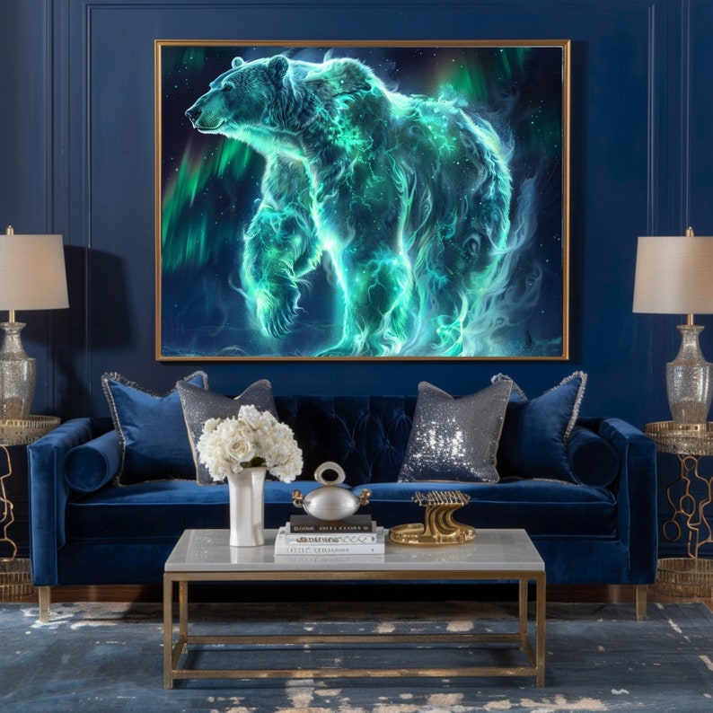 May include: A blue velvet sofa with two pillows, one white and one silver, sits in front of a large framed print of a glowing green bear against a blue and green aurora borealis background. A coffee table with a white marble top and gold metal frame sits in front of the sofa.