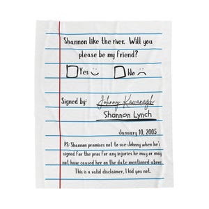 May include: A white fleece blanket featuring a printed design of notebook paper with blue horizontal lines and a red vertical margin. The text reads: Shannon like the river. Will you please be my friend? Yes, No, Signed by Johnny Kavanagh, Shannon Lynch, January 10, 2005, and a legal disclaimer.