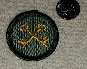 Insignia de competencia de Girl Scouts Junior Vintage: Ama de llaves