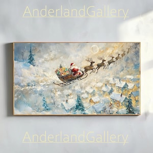 Könnte beinhalten: Gerahmtes Gemälde, das den Weihnachtsmann in einem von Rentieren gezogenen Schlitten zeigt, der über ein schneebedecktes Dorf fliegt. Das Kunstwerk zeigt eine Winterszene mit Vollmond und dem Text "AnderlandGallery". Die Farbpalette umfasst Blau-, Weiß- und Brauntöne.