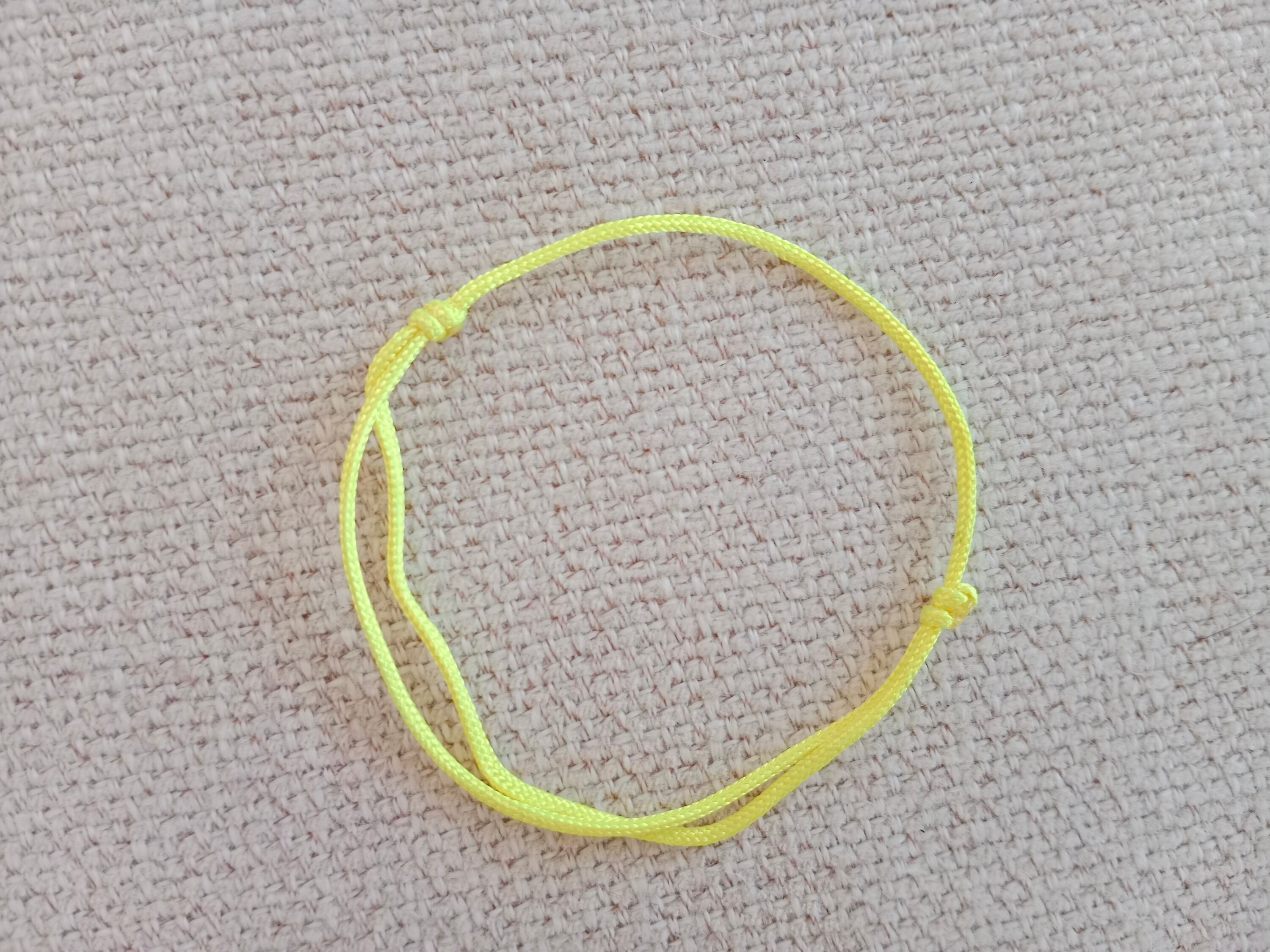 Yellow store string bracelet