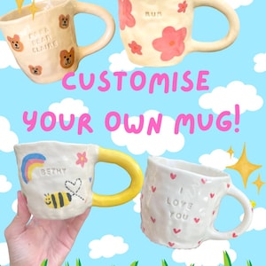 May include: Four handmade ceramic mugs with unique designs. One mug has teddy bears, another has pink flowers and the word "MUM", a third has a bee and rainbow, and the last has hearts and the words "I LOVE YOU". The text "CUSTOMISE YOUR OWN MUG!" is also visible.