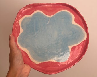 seconds: pink and blue plate with crack