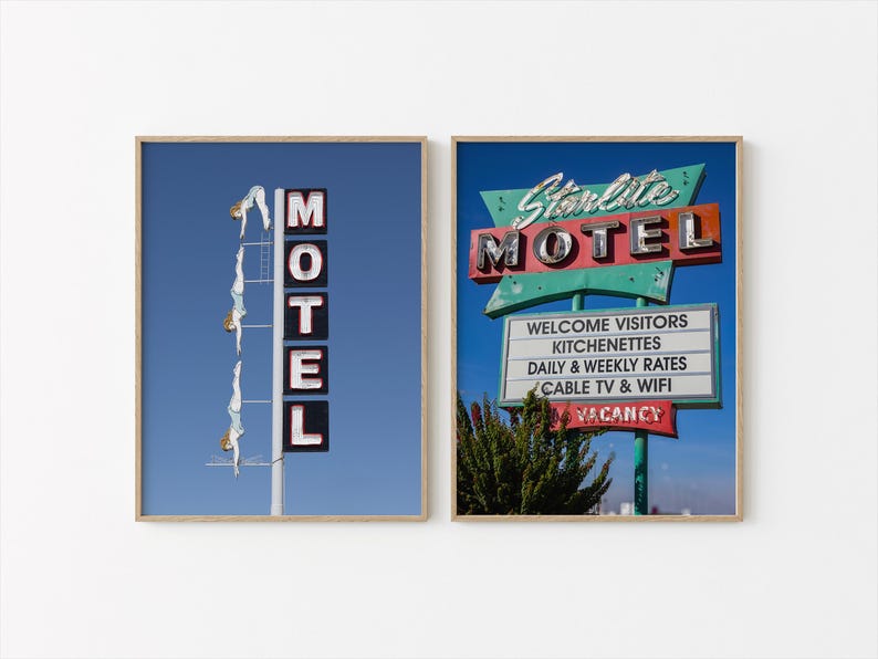 May include: Two framed prints of vintage motel signs. One features a tall sign with the word "MOTEL" in illuminated letters against a blue sky. The other shows a "Starlite MOTEL" sign with a list of amenities.