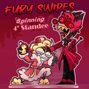 Puede incluir: Un standee de 10 cm con dos personajes de dibujos animados en rojo y negro. El standee tiene el texto "Fury Swipes" y "Spinning 4" Standee". Un personaje sostiene un pequeño pollo. El otro personaje lleva un traje rojo.