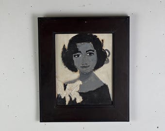 May include: A framed portrait painting of a woman with dark hair and a black dress. The painting uses a grayscale palette with white accents on the woman's collar. The frame is dark brown.