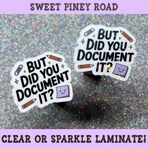 May include: Two die-cut stickers featuring the black text BUT DID YOU DOCUMENT IT? surrounded by illustrations of a paperclip, two pencils, and a smiling purple sticky note. The stickers have a white border and a holographic sparkle finish.