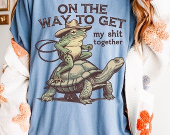 On My Way To Get My Sh*t Together Tshirt, Frog Riding Turtle Shirt, Funny Gen Z Meme Humor T-Shirt, Hilarious Cowboy Toad Tee