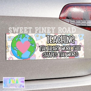 May include: A colorful car magnet with a globe, heart, and the text "TEACHING THE HEART WORK THAT SHAPES THE WORLD".