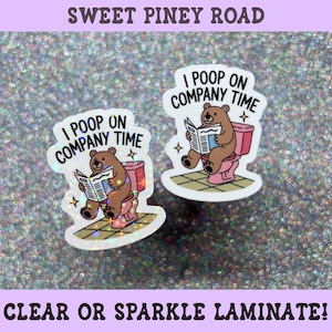 May include: Two die-cut stickers featuring a brown bear sitting on a pink toilet reading a newspaper. The text I POOP ON COMPANY TIME is printed above the bear. One sticker has a holographic sparkle finish, while the other has a matte finish.