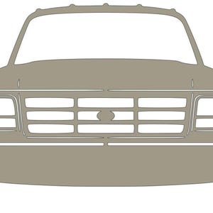 May include: A gray front view of a pickup truck with a black grille and headlights.