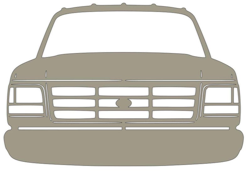 May include: A gray front view of a pickup truck with a black grille and headlights.