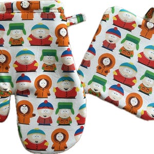 May include: A pair of South Park themed oven mitts. One mitt is a potholder and the other is a full-hand mitt. Both mitts feature a white background with a repeating pattern of South Park characters in various colors.