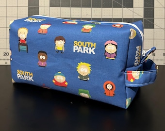 South Park Toiletry Bag  |  8.5 in L X 4 in WX 4.5in H | Duck Fabric Canvas Interior