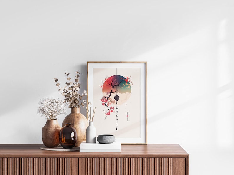 May include: A framed art print featuring a Japanese-inspired design with a red and blue circular motif, a tree branch, and Japanese characters. The print is displayed on a wooden cabinet, alongside vases and decorative items.