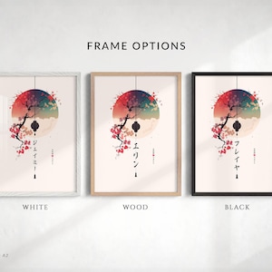 May include: Three framed art prints showcasing a Japanese-inspired design. Each print features a tree branch with cherry blossoms, a lantern, and a colorful circular background. The frames are white, wood, and black.