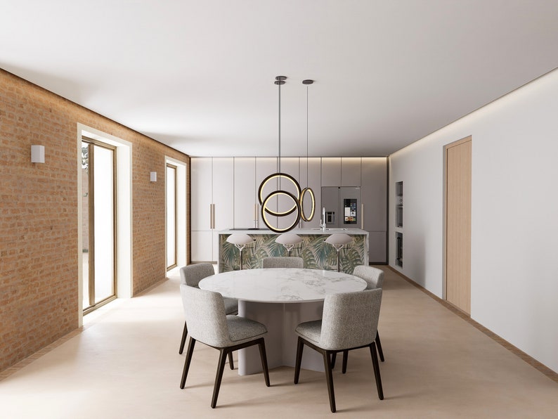 Puede incluir: Un comedor moderno con una mesa de m&aacute;rmol blanco y seis sillas. La mesa est&aacute; iluminada por una l&aacute;mpara colgante de anillo negro y dorado. La habitaci&oacute;n tiene una pared de ladrillo, paredes blancas y pisos de madera.