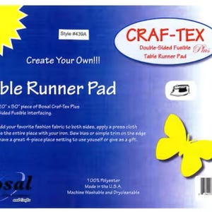 May include: A blue and white package for a table runner pad. The package includes the text "Craf-Tex Double-Sided Fusible Plus Table Runner Pad". The pad is pre-cut to 20" x 50" and made of 100% polyester.