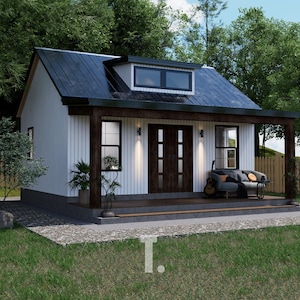 May include: A small, white house with a dark blue roof and a porch. The house has a dark brown door and windows. There is a small couch on the porch, and a guitar is leaning against the wall. The house is surrounded by trees and grass.