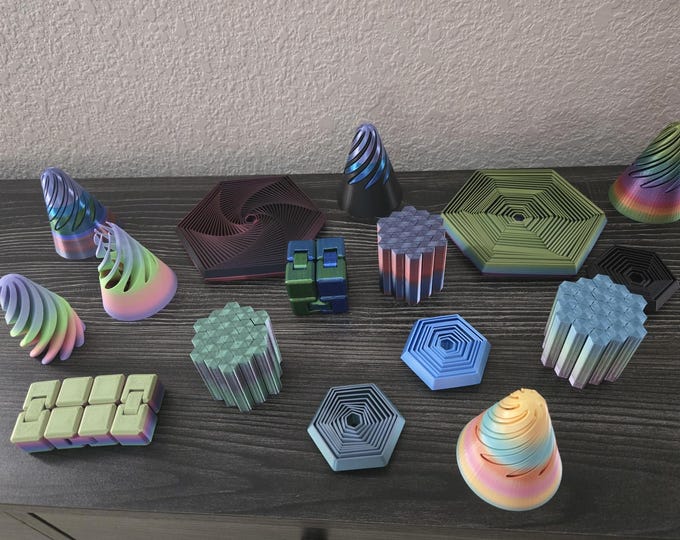 Featured listing image: 3D Printed Box of 5 Surprise Fidget Toys Impossible Passthrough Cone Vortex Hexagon Super Twist Fidget Infinity Cube Christmas Gift Box