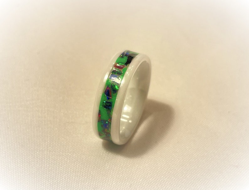 Custom White Ceramic Ring With a Green Inlay Powder That Includes a