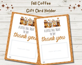 May include: Two printable gift card holders with a fall coffee theme. Each card features a line of fall-themed coffee cups with pumpkins and leaves. The text reads "A little fall treat to say thank you".