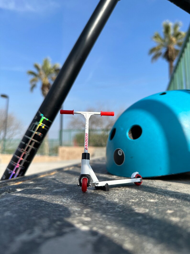 Miniature Finger Scooter Experience Extreme Sports in the Palm of Your