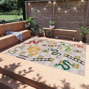 Giant Snakes and Ladders. The Life-Size Board Game Area Rug